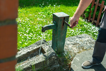 Water from a public water pump.