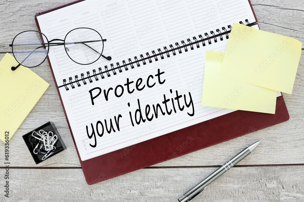 Poster protect your identity open diary with text on the pages