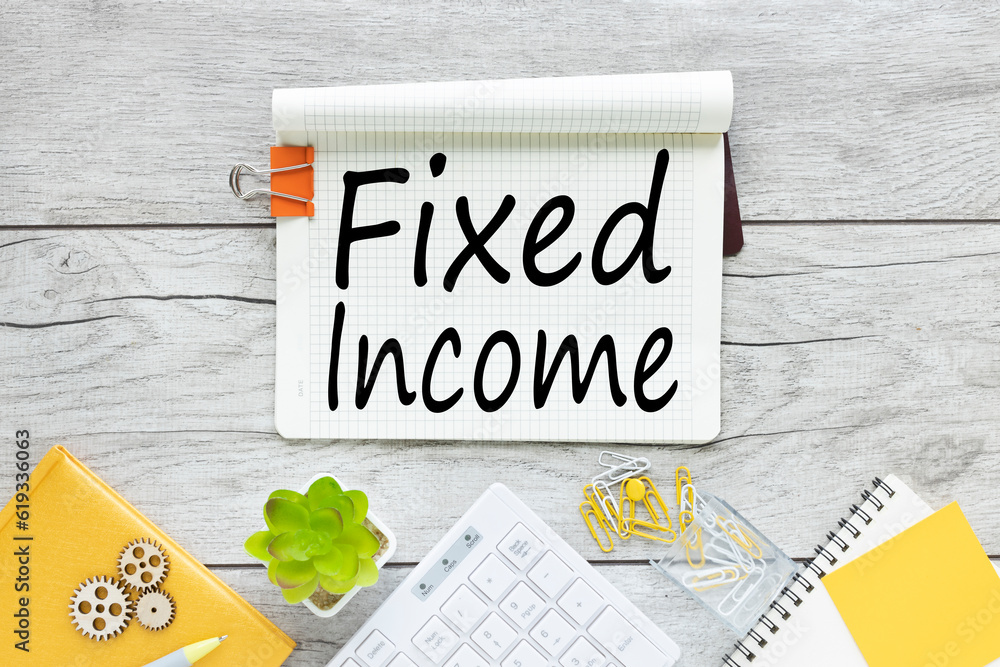 Poster fixed income notepad with clip and text near keyboard calculator and glasses