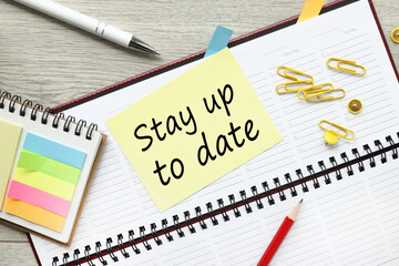 stay up to date. the text on the yellow sticker is attached to the sticker