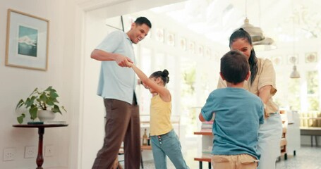 Excited, family and parents with children, dancing or quality time with wellness, silly and playful at home. Celebration, mother and father in a living room, happiness and loving together with energy - Powered by Adobe