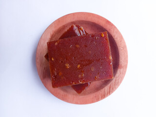 Jenang is a traditional Indonesian snack made from glutinous rice flour, brown sugar and coconut...