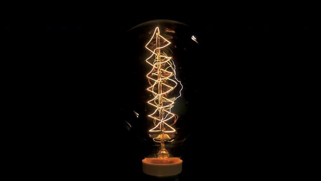 Light bulb and electric sparks 4k resolution