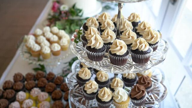 cupcakes and cake dessert table at wedding stock video footage variety