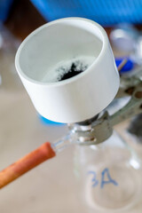 Laboratory glassware on the gas burner. Chemical laboratory equipment.