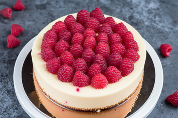 Raspberry Cheesecake- Creamy and velvety cheesecake infused with sweet raspberries, served with a buttery graham cracker crust