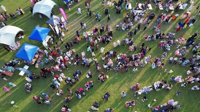 Time Lapse Footage of Public Funfair Held at Lewsey Public Park of Luton with Free Access for Muslim Community on Islamic Holy Eid Festival Day. Captured with Drone's Camera on June 29th, 2023