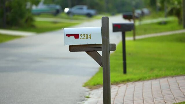 Typical american outdoors mail box on suburban street side