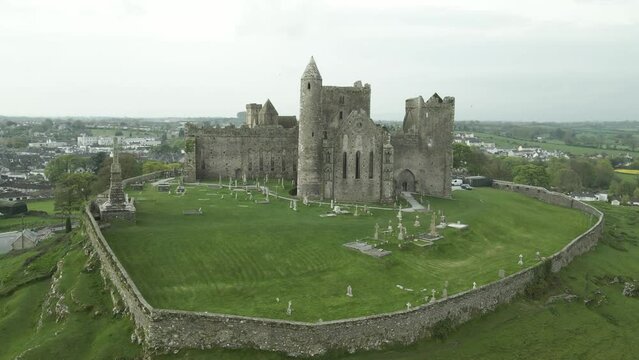 Medieval Fortress Of The Rock Of Cashel On Top Of The Hill In County Tipperary, Ireland, aerial, dolly zoom