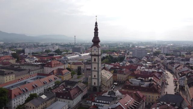 Panoramic view of Klagenfurt. Aerial circling Klagenfurt Cathedral, Austria