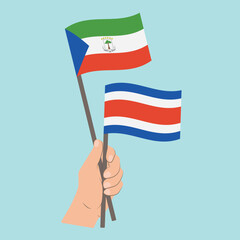 Flags of Equatorial Guinea and Costa Rica, Hand Holding flags