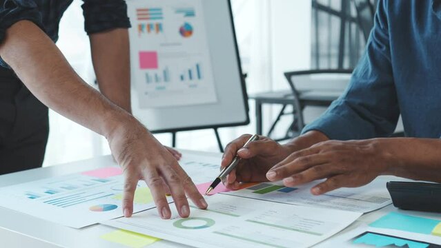 Business adviser analyzing financial figures denoting the progress in the work of the company.