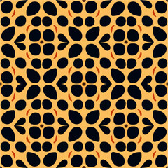Textured background in black and yellow, resembling the skin of baked beans, creates a visually appealing organic pattern on a smooth orange base.