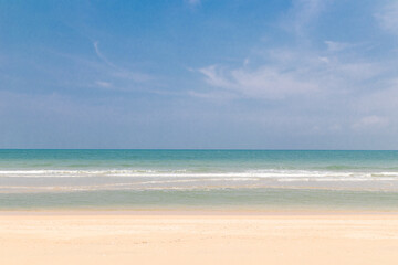 Fototapeta na wymiar View of beautiful tropical sea beach with blue sky.
