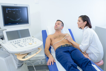 Male patient having heart scan