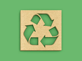 Recycle symbol on cardboard isolated on green background. Clipping path included