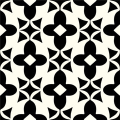 Intricate black and white geometric pattern evokes a sense of grandeur. The ornate motifs, reminiscent of damask and art deco styles, exude opulence and sophistication.