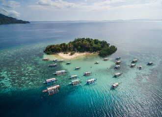 CYC beach in Coron, Palawan, Philippines. Corn Youth Club Beach. Mountain and Sea in background. Tour A. Drone © Mindaugas Dulinskas