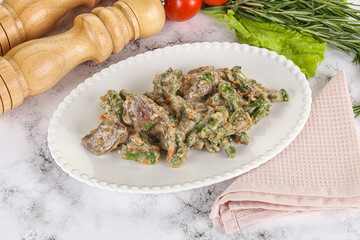 Fried turkey liver with herbs in cream sauce