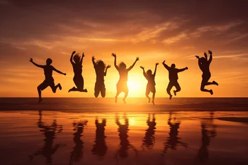 Foto auf Acrylglas Orange Lifestyles and leisure concept. Young adults people and friends dark silhouettes jumping into air at beach during sunset. Generative AI