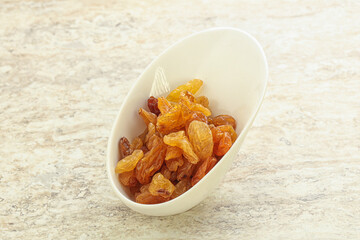 Sweet yellow raisin in the bowl