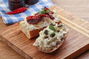 bruschetta with soft cheese capers and tomato