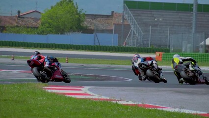 driving school. A racing track has been opened, where motorcycle riding trainings are held. Honda moto. A group of motorcyclists. Slow motion. Moto sport Italy Misano