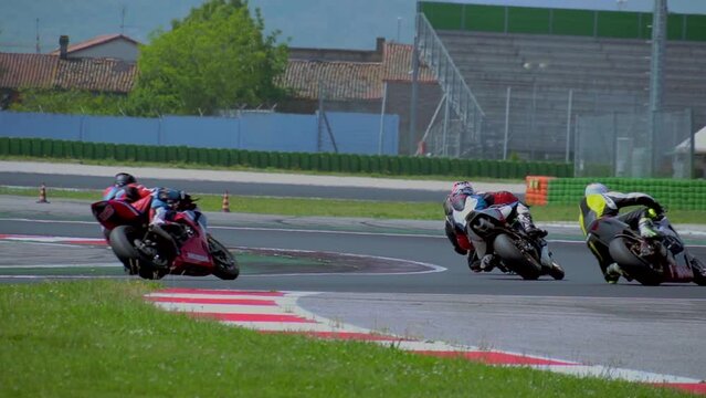 driving school. A racing track has been opened, where motorcycle riding trainings are held. Honda moto. A group of motorcyclists. Slow motion. Moto sport Italy Misano