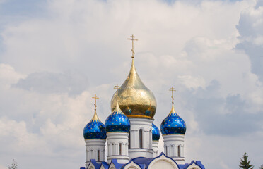 Beautiful Orthodox church against the backdrop of a stormy sky.