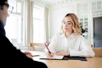 Consultation with a psychologist, a woman reception in the office, a woman consultant in the office.