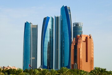 Stunning view of the vibrant city skyline of Abu Dhabi, with towering modern skyscrapers