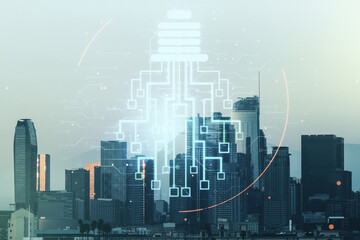 Plakat Virtual creative light bulb with chip hologram on Los Angeles office buildings background, artificial Intelligence and neural networks concept. Multiexposure