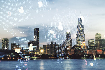 Double exposure of social network icons hologram and world map on Chicago city skyscrapers background. Marketing and promotion concept