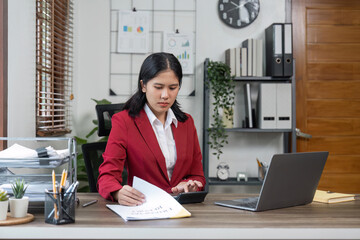 businesswoman working on laptop computer, Young female making, Accounting woman taxes calculation