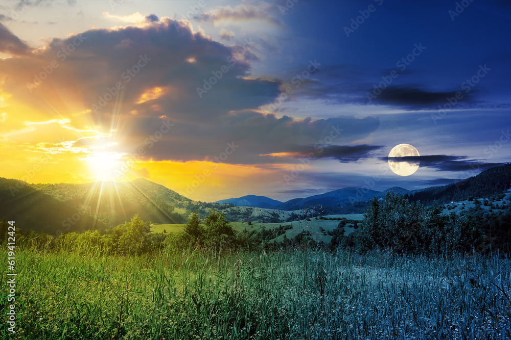 Wall mural day and night time change concept. alpine meadow with tall grass on a background of mountains with s