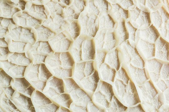 Cleaned and washed raw cattle tripe texture background, close up