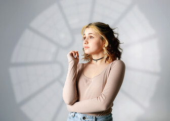 Modern beautiful girl in a photo studio