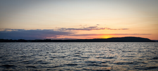 Summer lake panorama at sunset