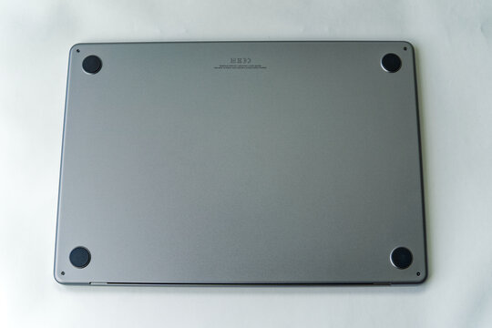 Close-up high angle bottom view of laptop Apple Macbook Air 2023 M2 8-Core, 15.3&rdquo;, 16G RAM, 512GB SSD, 10-Core GPU, 70W. Photo taken July 3rd, 2023, Zurich, Switzerland.