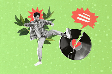 Photo picture of young aggressive funny guy kick leg broken vinyl disc heartbroken dramatic music aggression isolated on green background