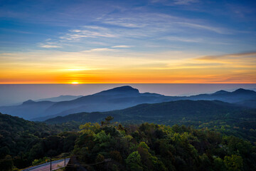 Beautiful landscape of the sunrise viewpoint which is the highest mountain of Thailand in the morning of the winter season at Doi Inthanon National Park, Chiang Mai, Thailand.