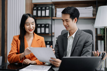 Asian business team creative businesspeople coworker in office. Meeting Presentation for analysis graph company financial. People Work in Business Office.