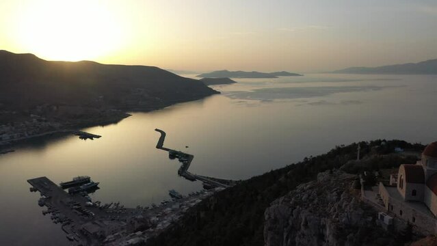 Drone shot, Greek Orthodox Monastery of Saint Savvas, Kalymnos town view, harbour and sea, Kalymnos, Dodecanese, Greece, Europe