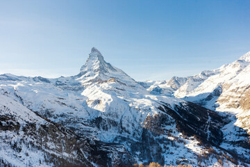 Fototapeta na wymiar Snowy mountain Matterhorn during the day in winter. Zermatt, swiss alps