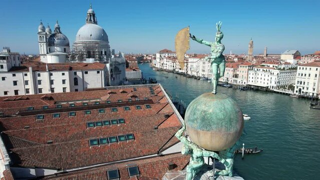 Italy, Veneto, Venice, Aerial view of Dogana da Mar, movable wind vane of the goddess Fortuna on a gilded globe, carried by atlases, Europe