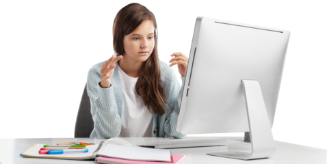 Happy smiling girl student watching learning online video class on a laptop