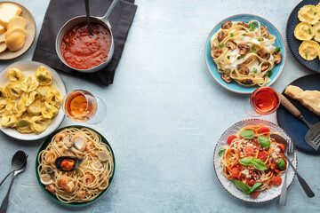 Pasta variety banner with copy space. Italian food and drinks, overhead flat lay shot. Spaghetti...