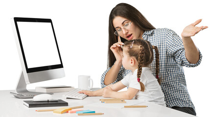 Happy busy mother working with a child on laptop