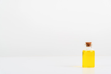 some test tube on the white table with beakers, flasks, and test tubes filled with colorful liquids