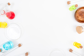 Top view science lab chemistry flask with beakers, flasks, and test tubes filled with colorful liquids